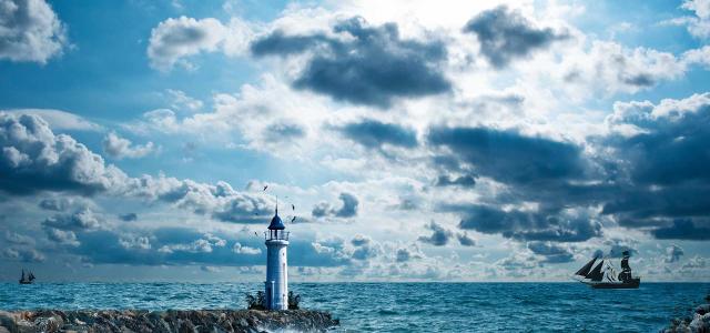 Lighthouse With Ships in Background