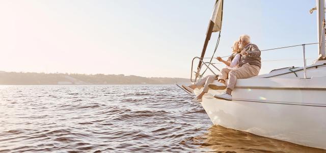 Retired Couple Sitting on a Sailboat